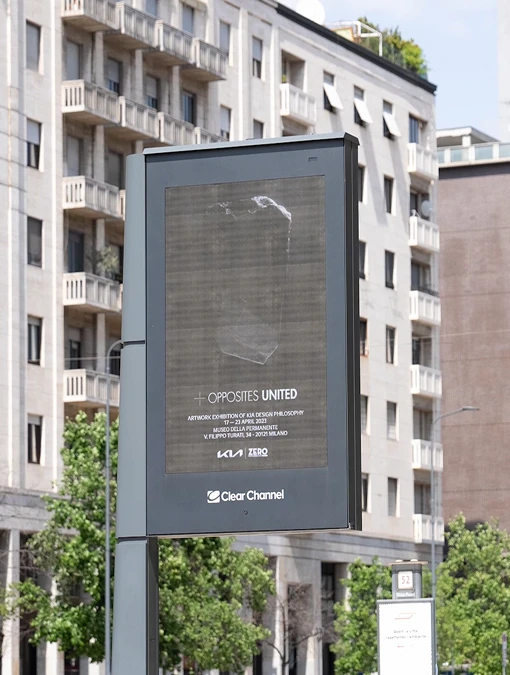 Large street billboard in Milan promoting Kia’s ‘23 OPPOSITES UNITED’ exhibition.