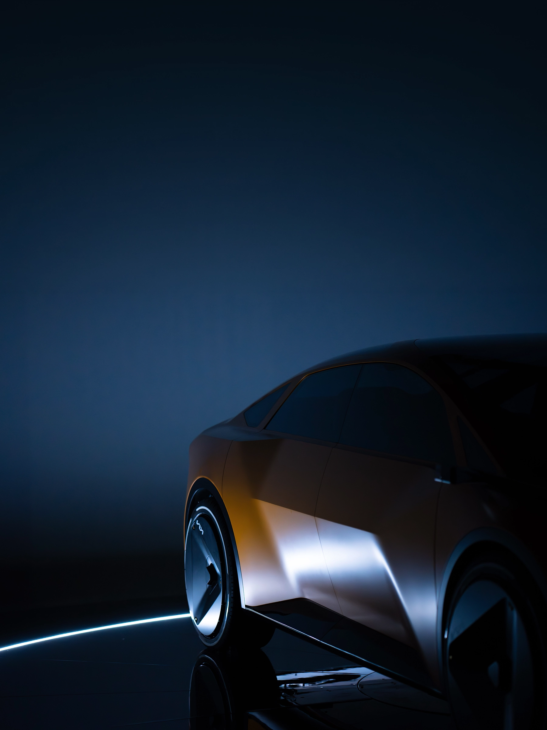 Side view of the Vision Meta Turismo concept vehicle highlighted by light and shadow