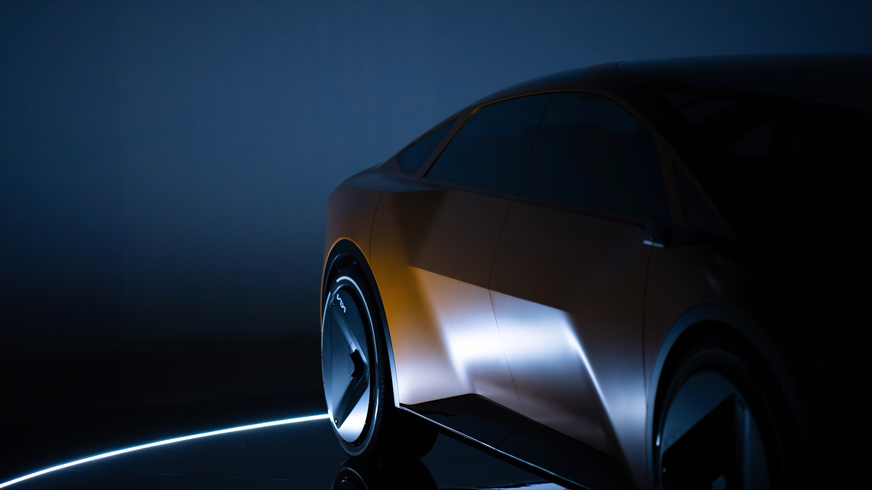 Side view of the Vision Meta Turismo concept vehicle highlighted by light and shadow