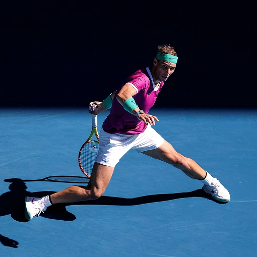 Rafael Nadal swinging his racket.
