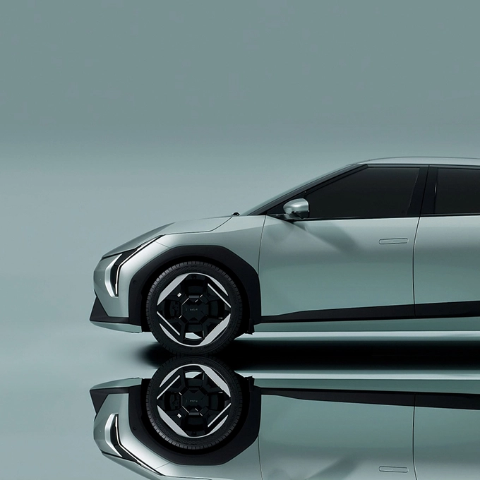 Front wheel and headlamp detail of the EV4.