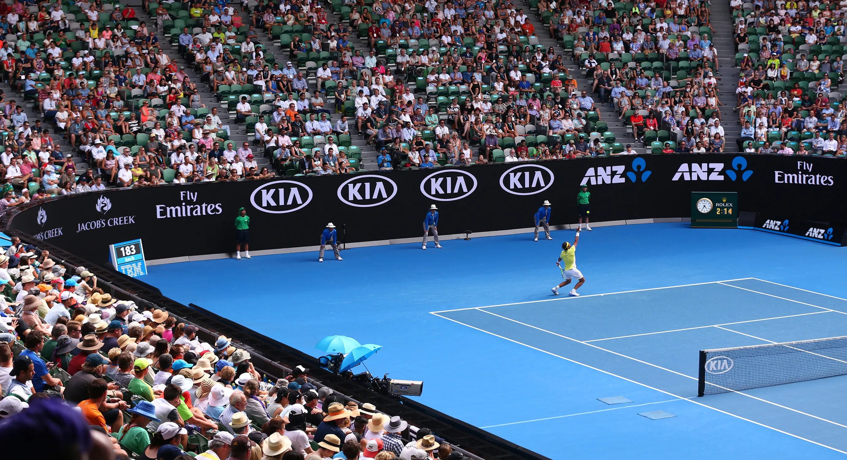 A packed Australian Open main court during a match.