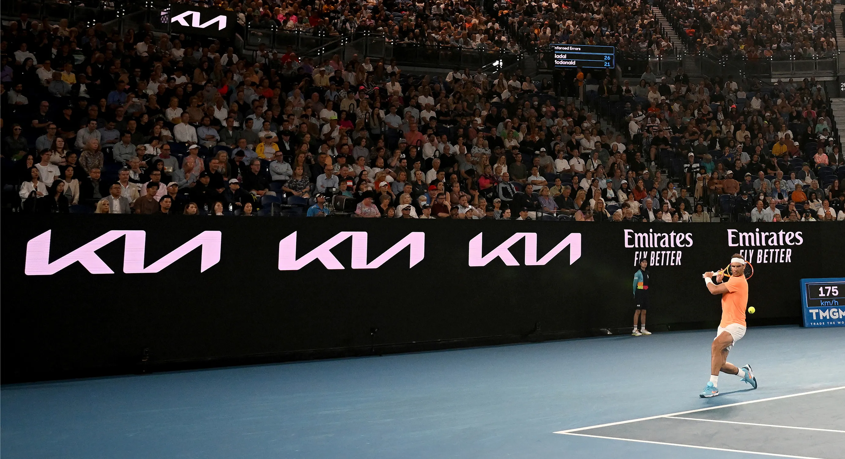 A view of the Australian Open court with spectators in the stands.