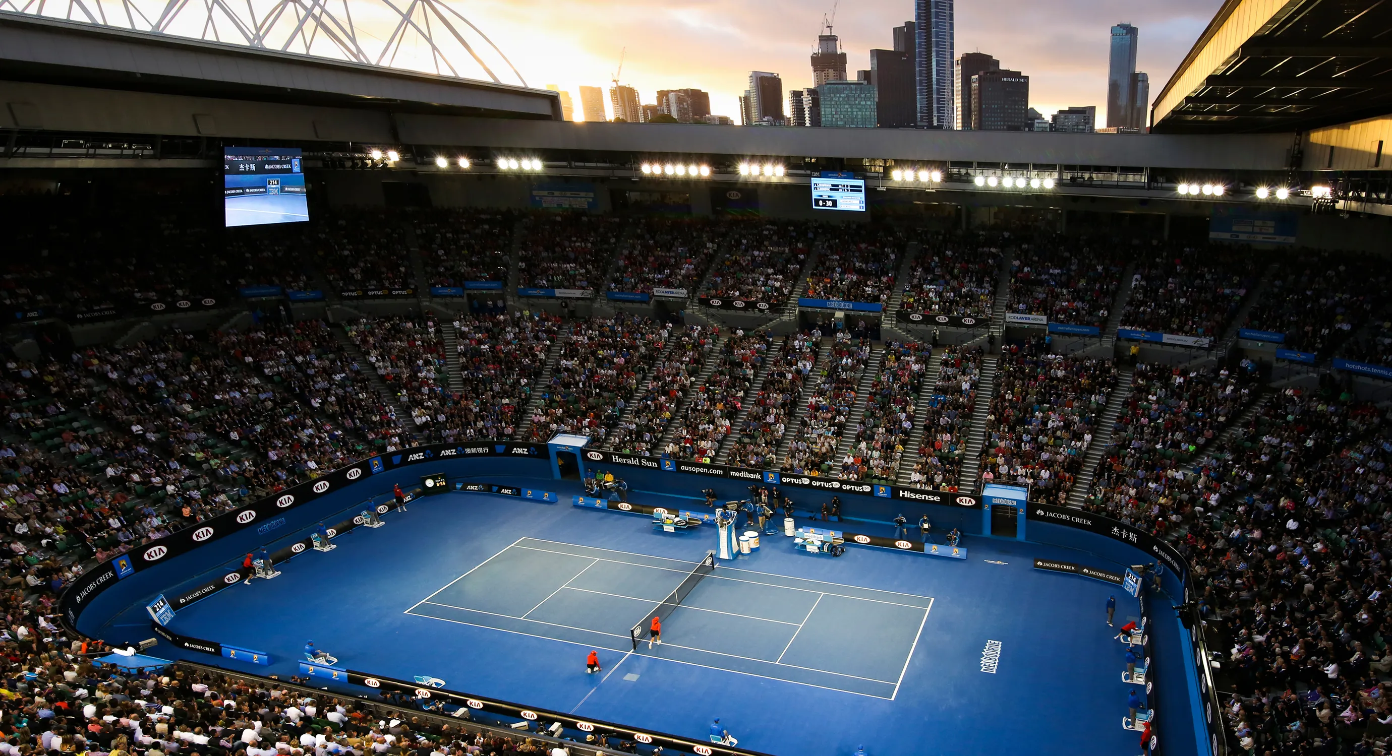 A packed Australian Open main court during a match.