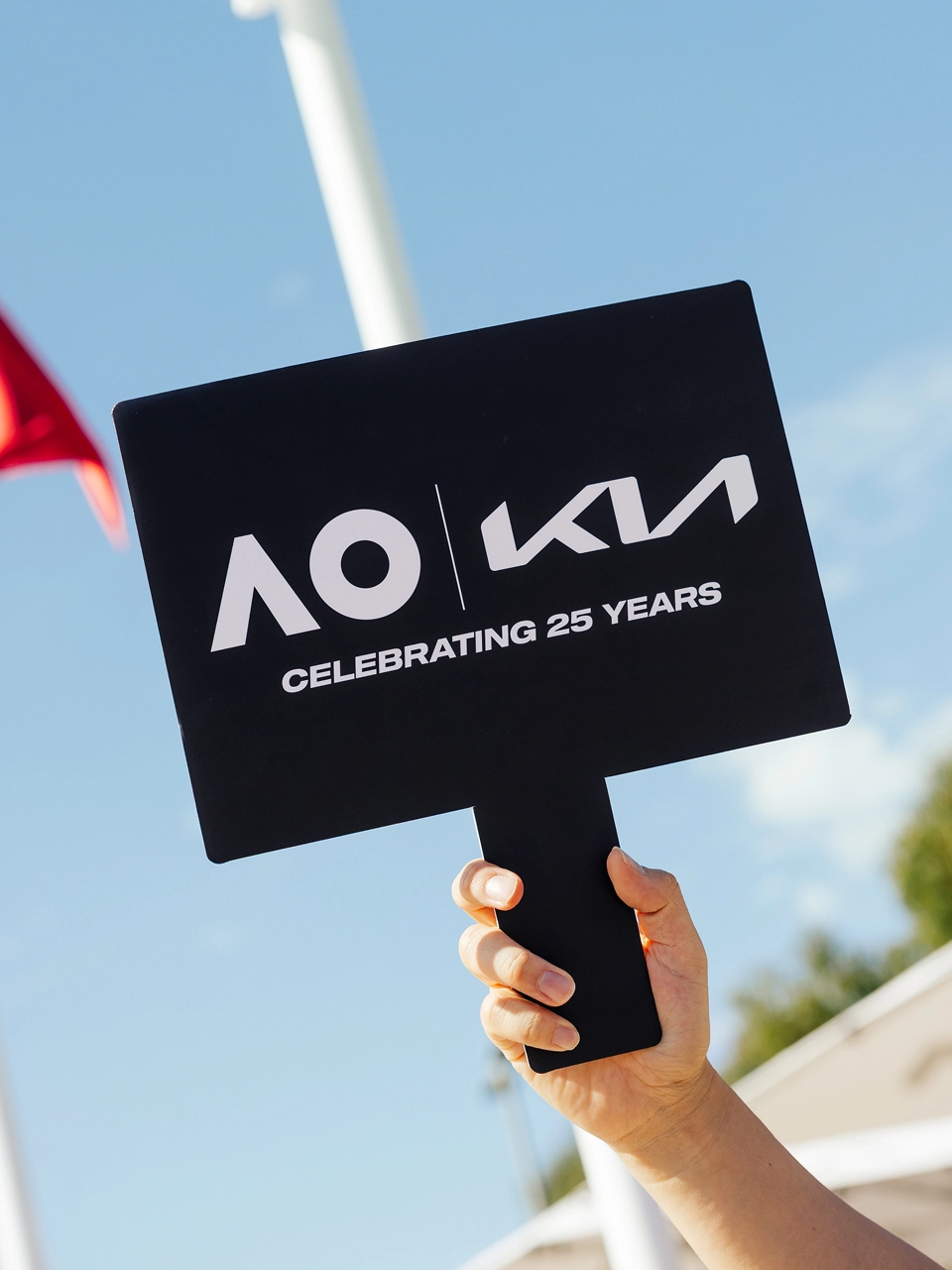 Image of a sign showing Kia Australian Open 25th anniversary logo