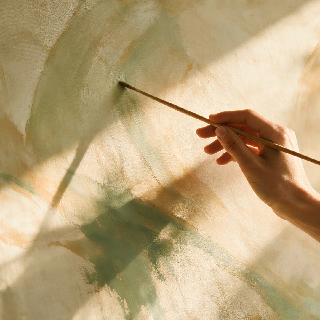 A hand painting on translucent fabric in sunlight