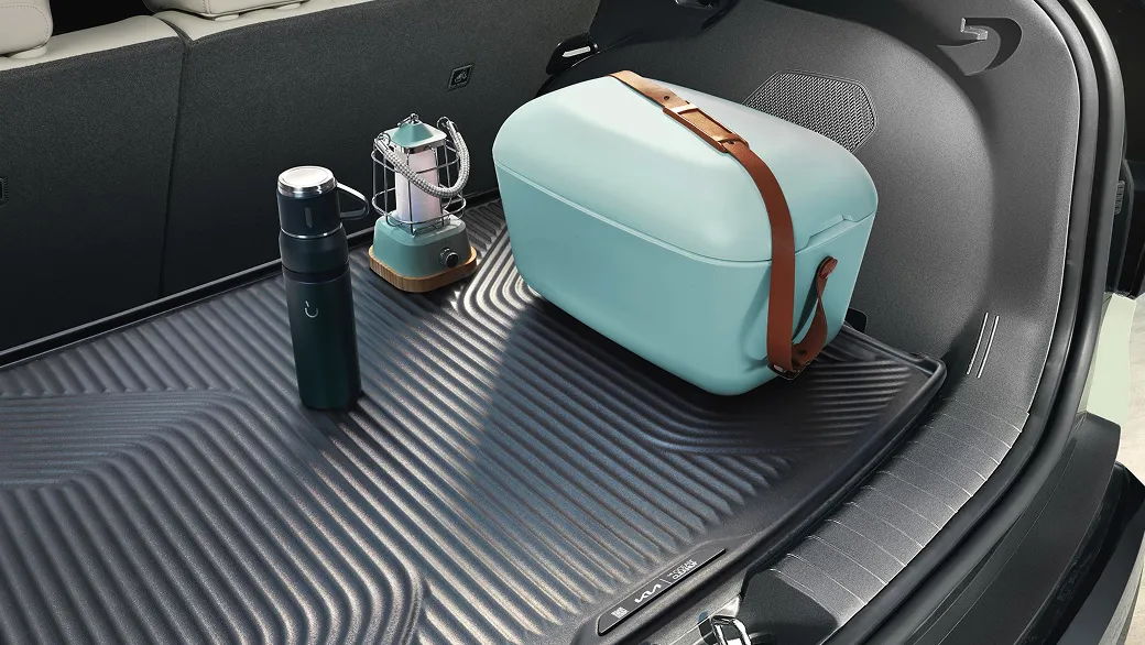 A limited-edition Kia EV3 trunk liner made from recycled plastic