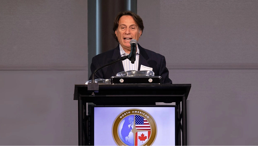 Scene of the Kia EV9 receiving the North American Car of the Year – Utility Vehicle of the Year award