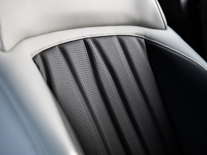 Close-up image of the eco-friendly interior seat material detail in the Kia EV9, winner of the 2024 Red Dot Award Best of the Best
