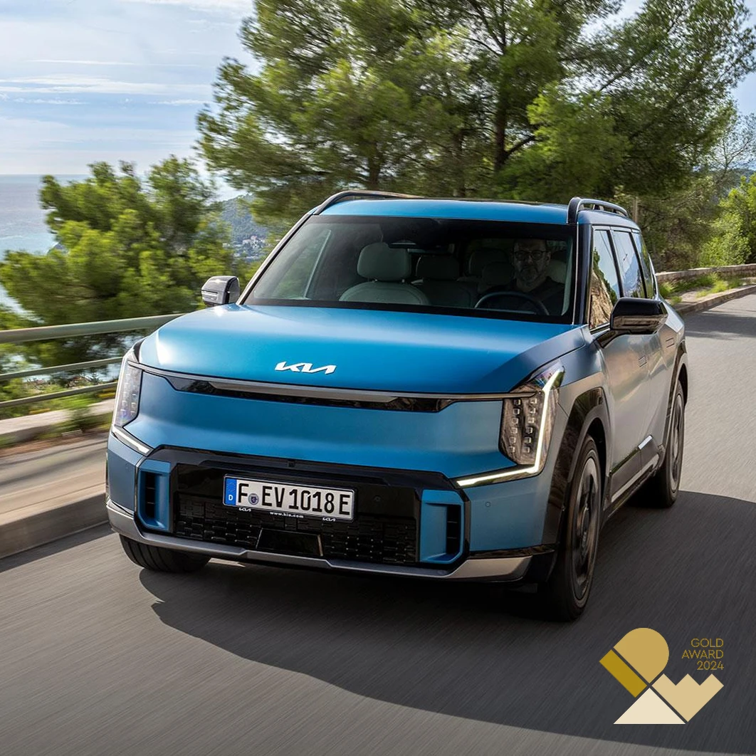 Interior cockpit image of the Kia EV9 featuring the panoramic display