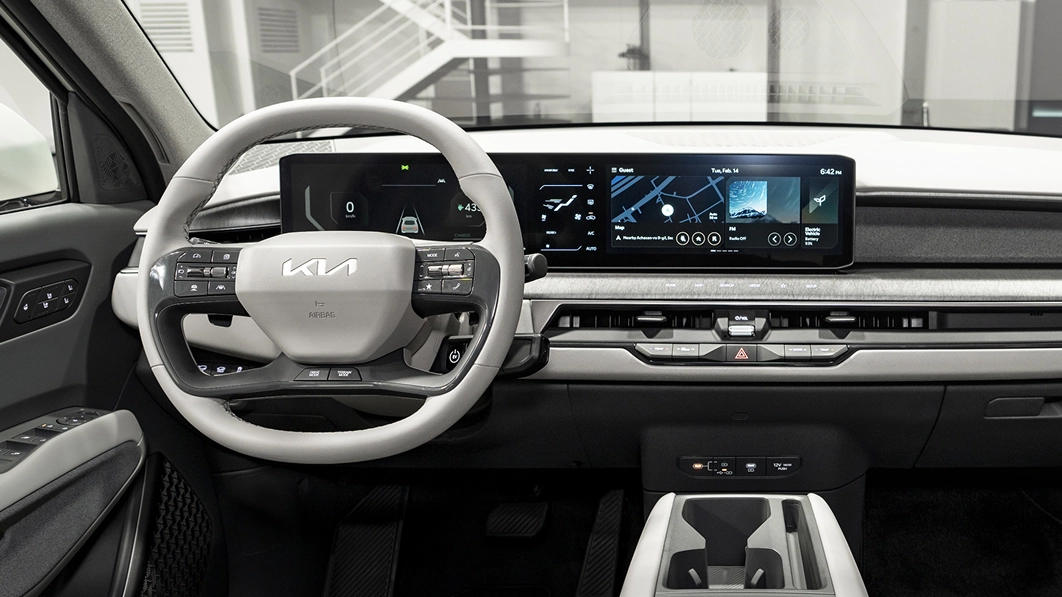 Interior cockpit image of the Kia EV9 featuring the panoramic display