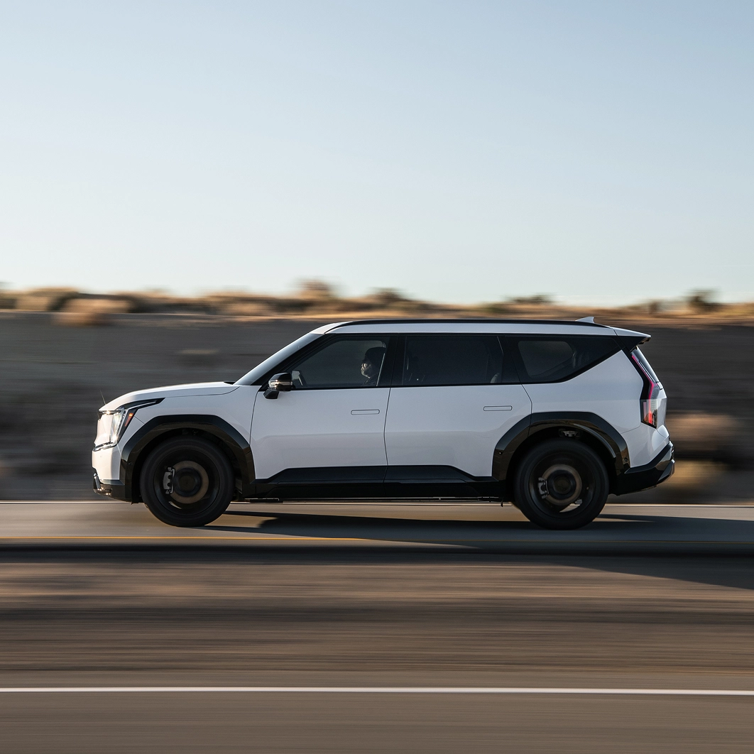 Driving image of the 2025 Kia EV9 awarded the 2025 IIHS TOP SAFETY PICK+ rating