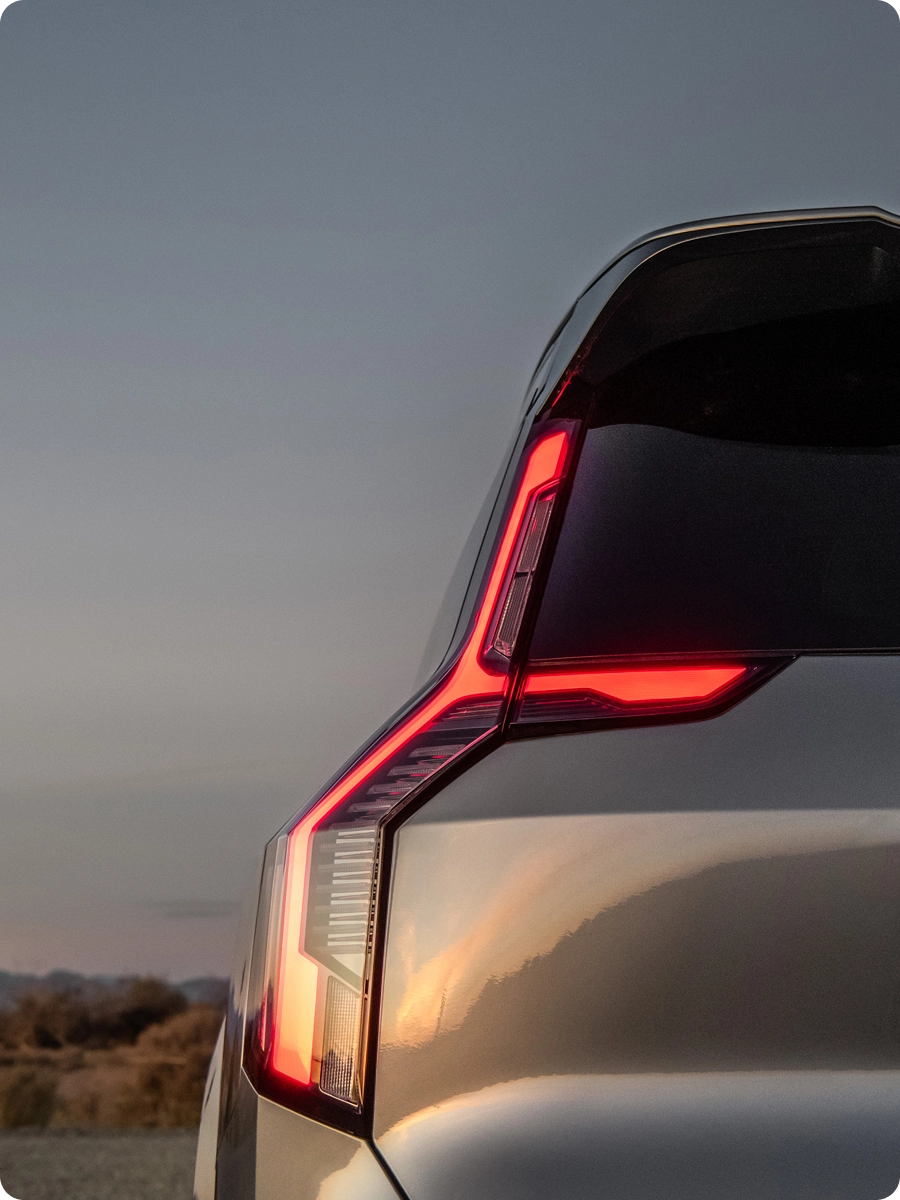 Close-up of the Kia EV9 rear lamp design featuring the Kia logo