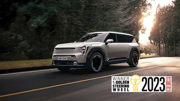 Kia EV9 driving on a city road