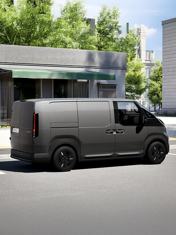 The Kia PV5 Cargo stopped on a city street