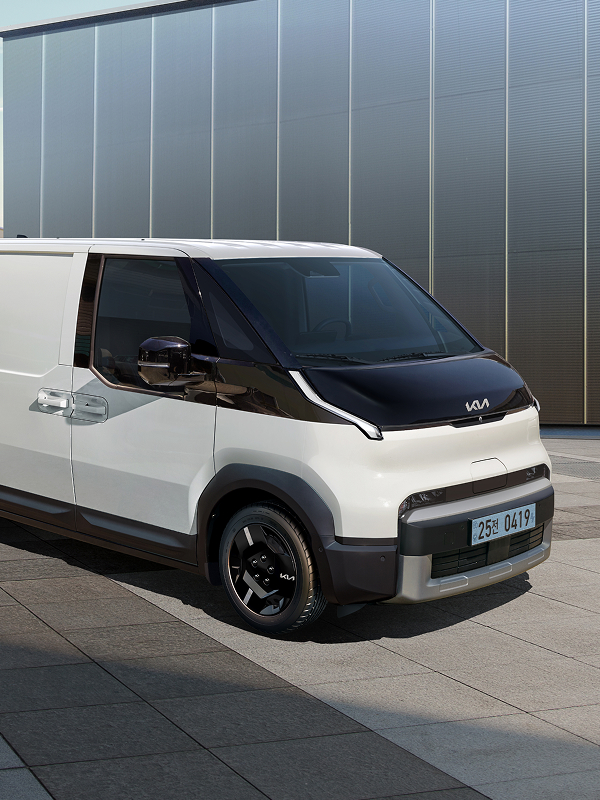 Front three-quarter exterior view of the Kia PV5 Cargo