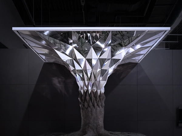 Large installation composed of repeated metallic surfaces at the Busan International Motor Show.