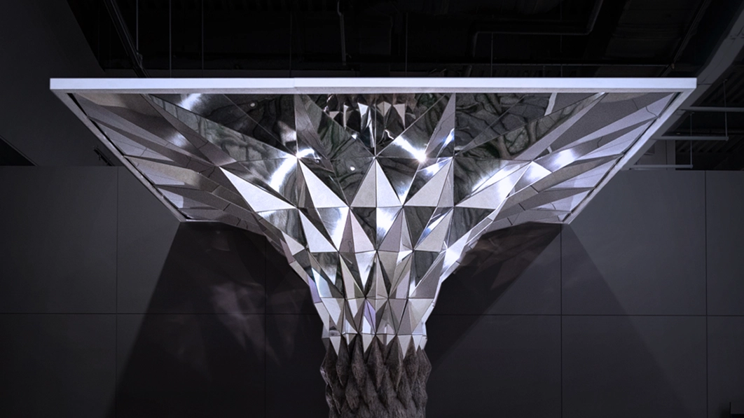 Large installation composed of repeated metallic surfaces at the Busan International Motor Show.