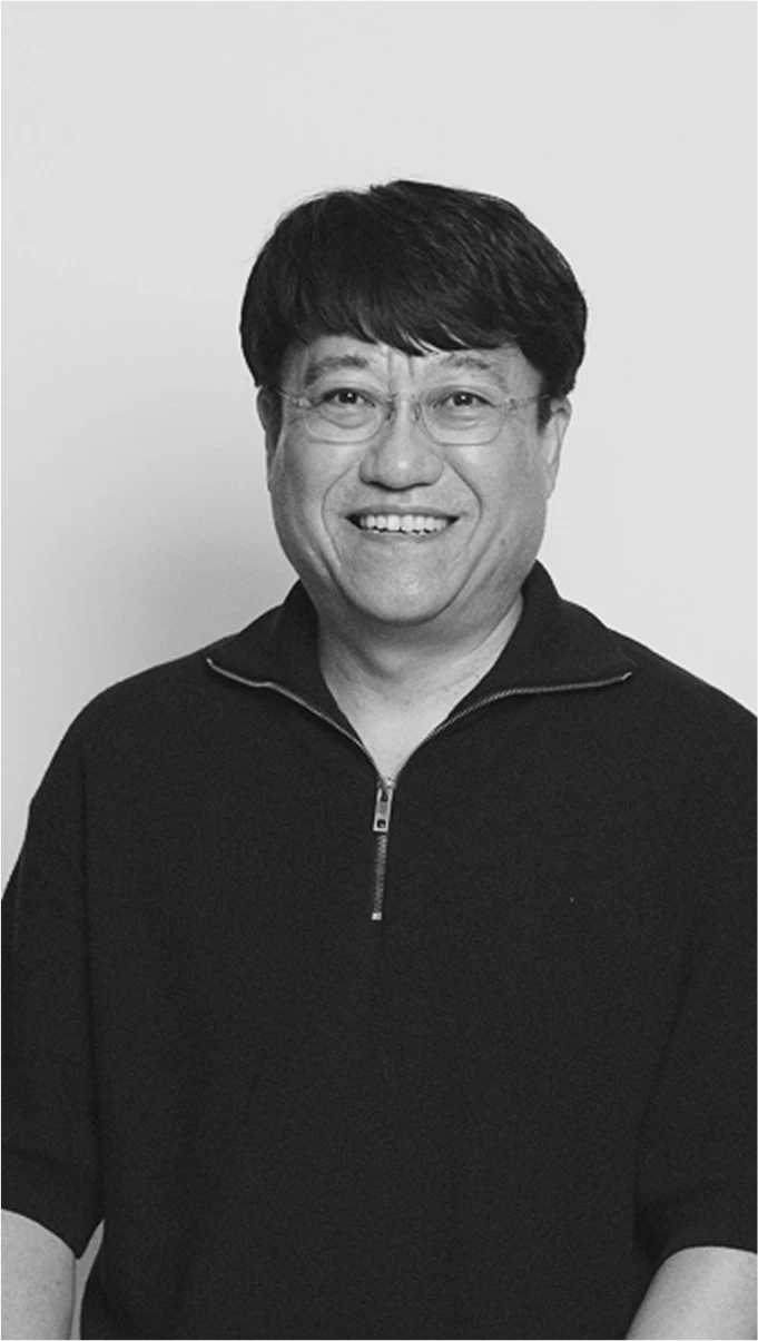 Black-and-white profile portrait of Kyungkyun Shin, Head of Kia Design Model Development