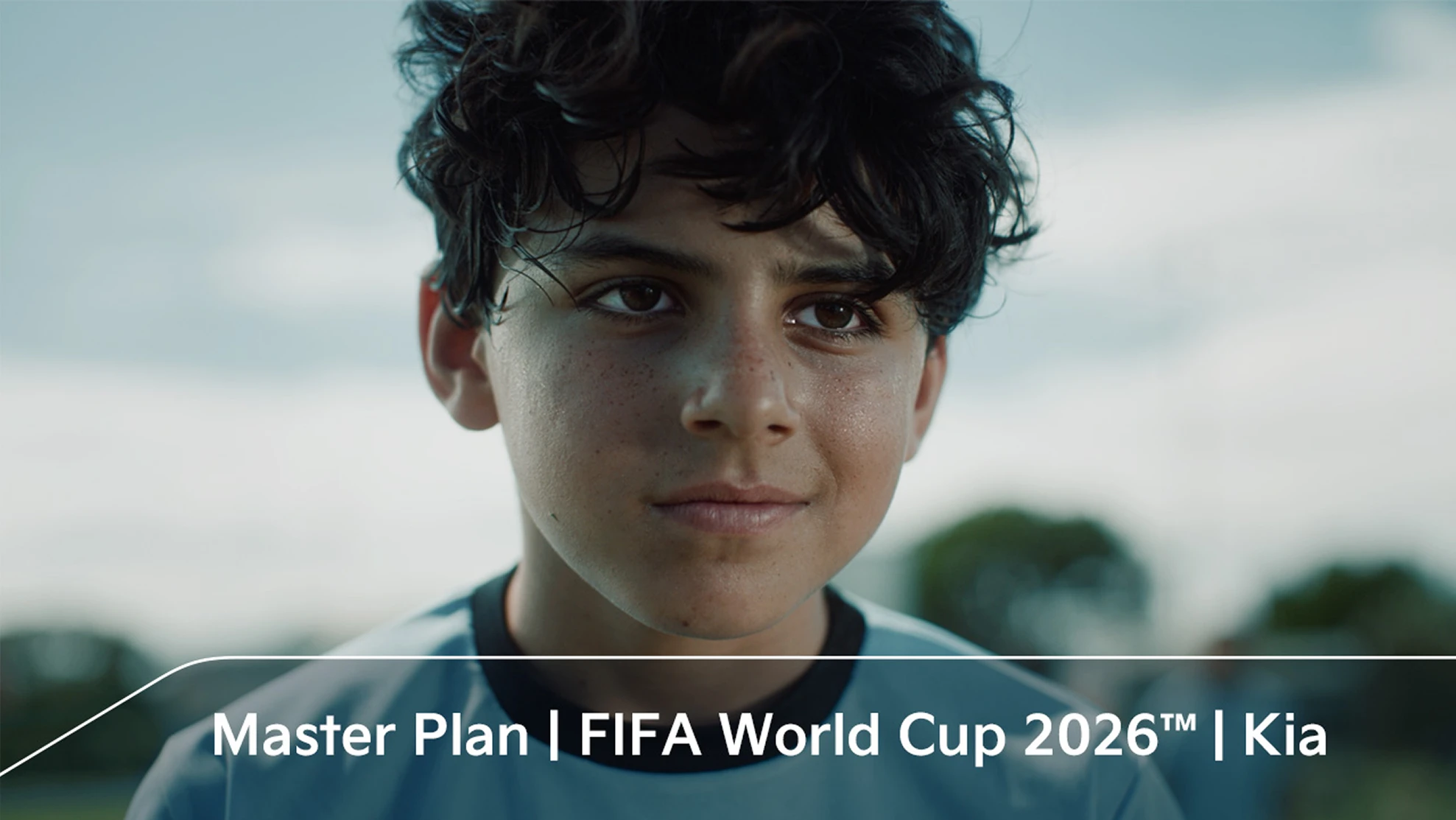 Close-up of a child aspiring to become a FIFA World Cup 2026 Official Match Ball Carrier in the OMBC campaign film