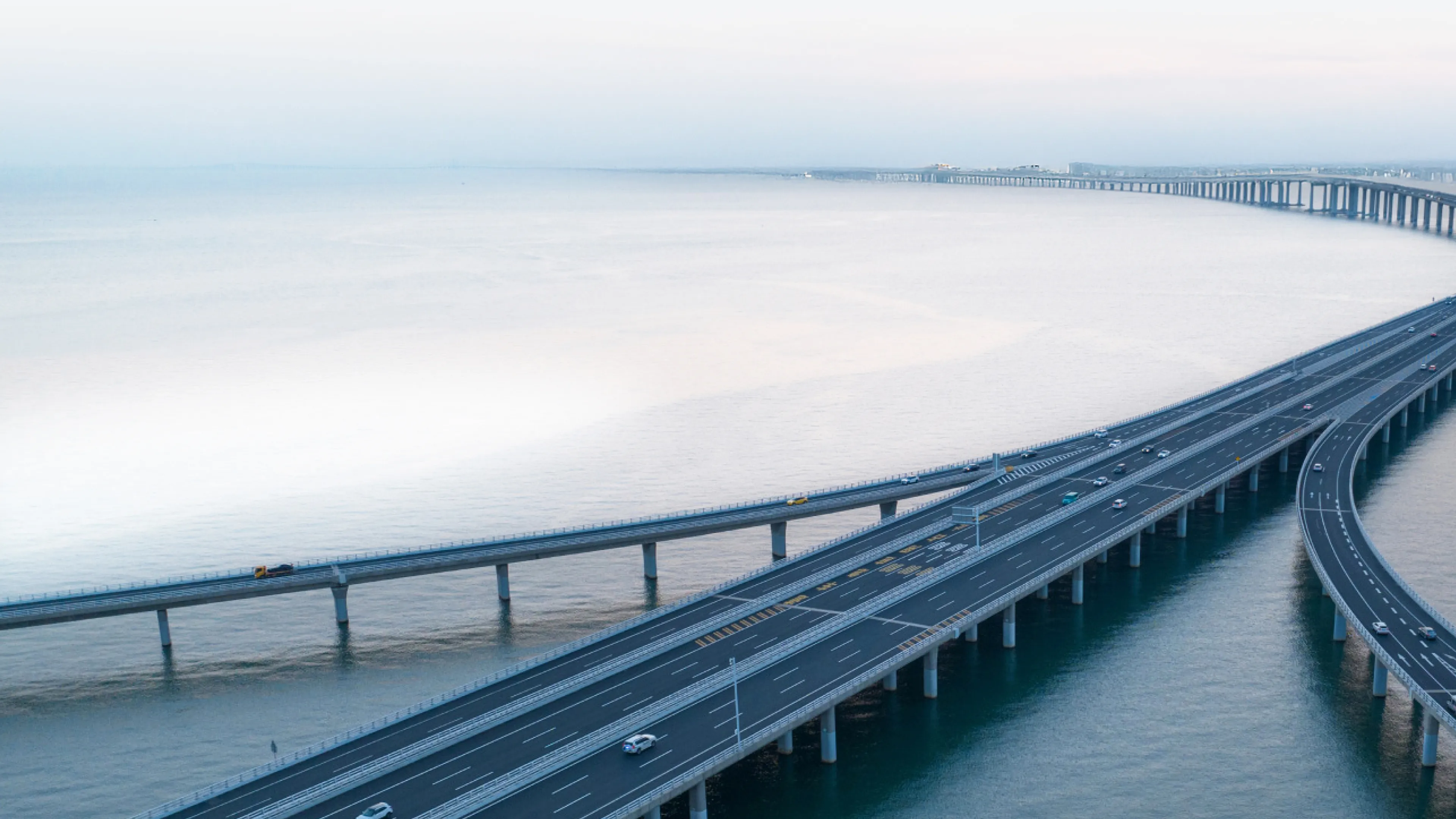 Curved sea bridge spanning across the ocean