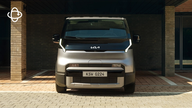 Front view image of Kia PV5 Cargo parked in front of a building
