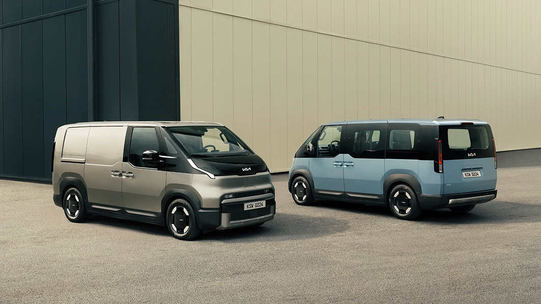Front three-quarter view image of the Kia PV5 Cargo and rear three-quarter view image of the Kia PV5 Passenger