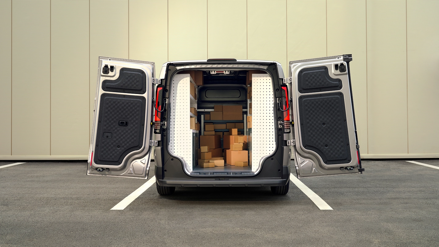 Rear cargo space image of Kia PV5 Cargo with rear doors open